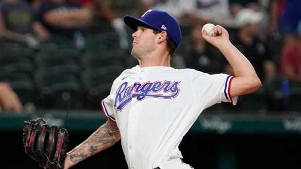 Aug 4, 2022; Arlington, Texas, USA; Texas Rangers starting pitcher Cole Ragans (50) throws to the plate during the first inning against the Chicago White Sox in his MLB debut at Globe Life Field. Mandatory Credit: Raymond Carlin III-USA TODAY Sports